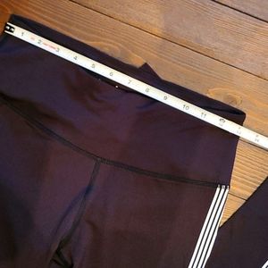 Bebe  woman's leggings size small, black and white